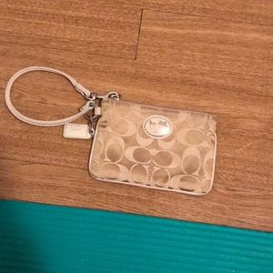 Coach cream wristlet